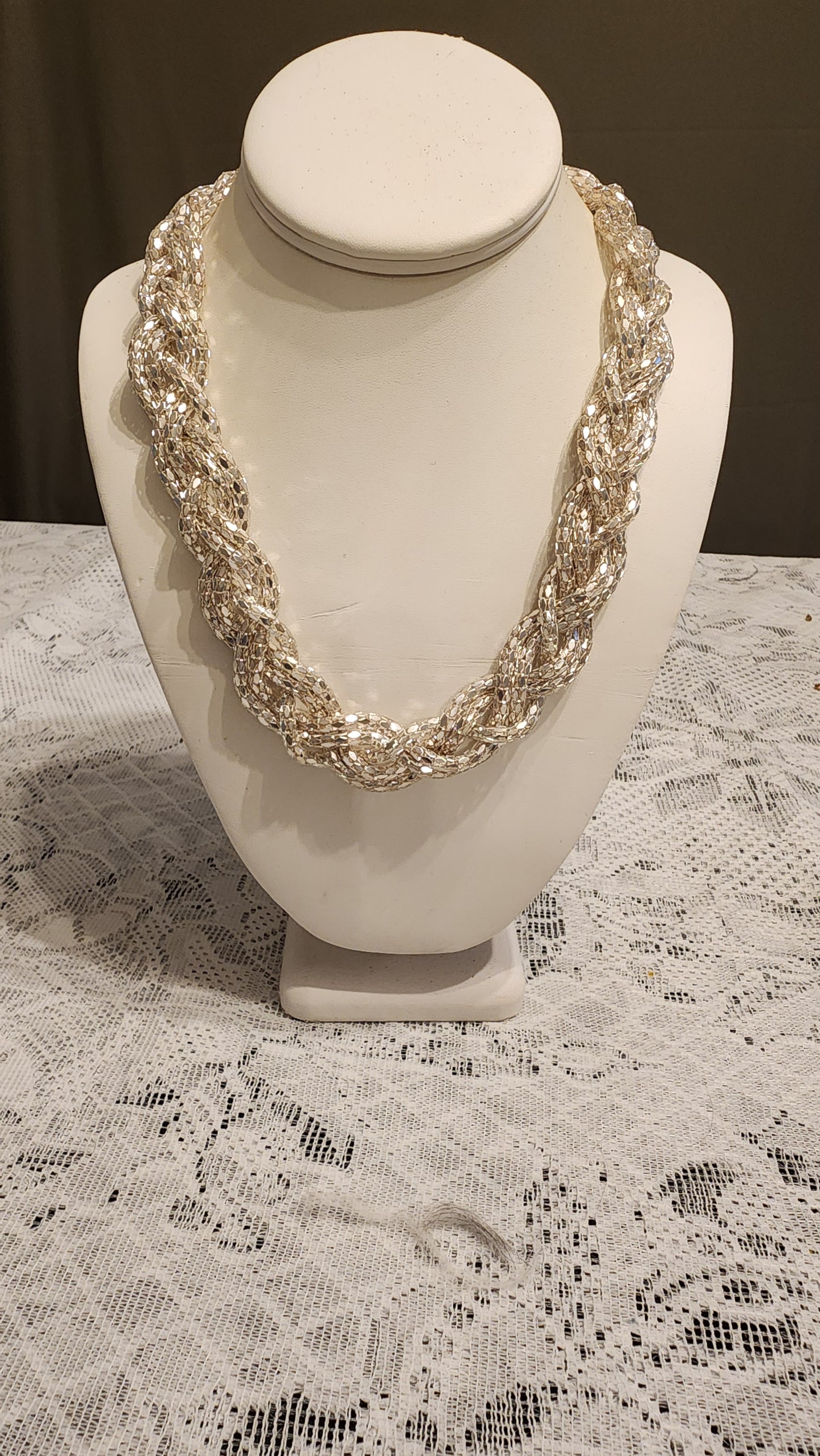 Silver tone braided necklace