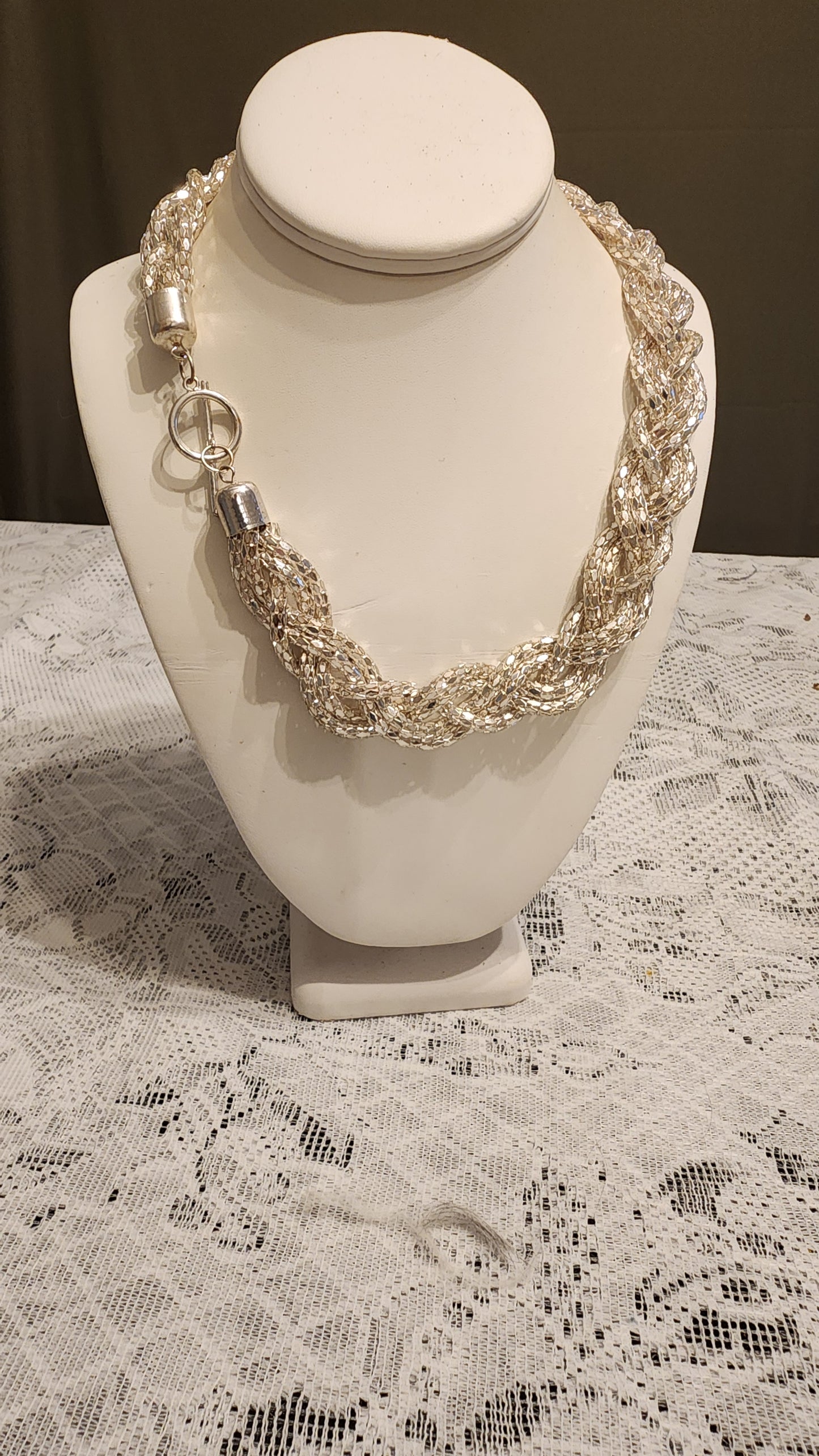 Silver tone braided necklace